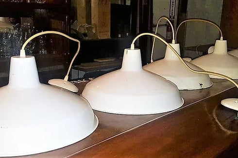 White hanging ceiling mounted lights