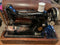 This unit has the key and carrying case. Still has thread in it still. It has th