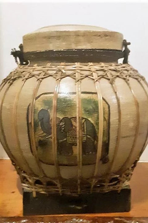 Antique Hand carved bulb type jug.