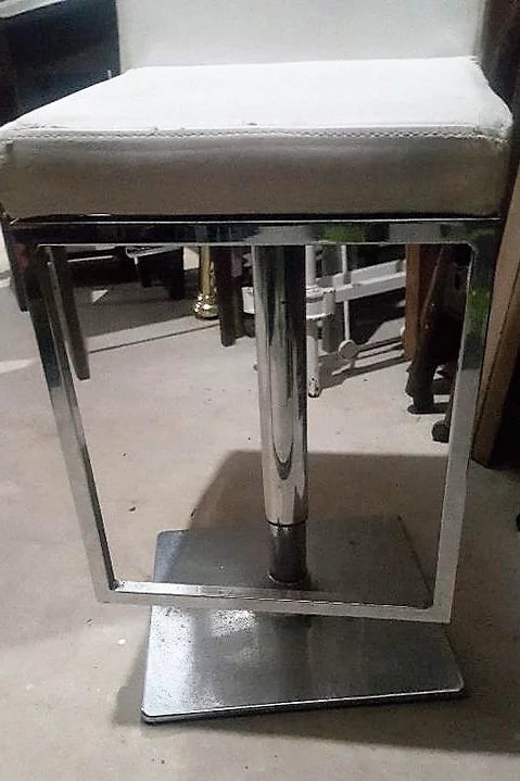 All white leather and chrome pub height spinning chairs. (6 of them)